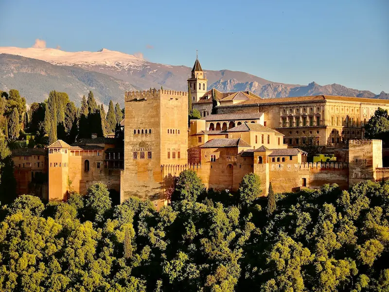 alhambra castle in spain surrounded by trees