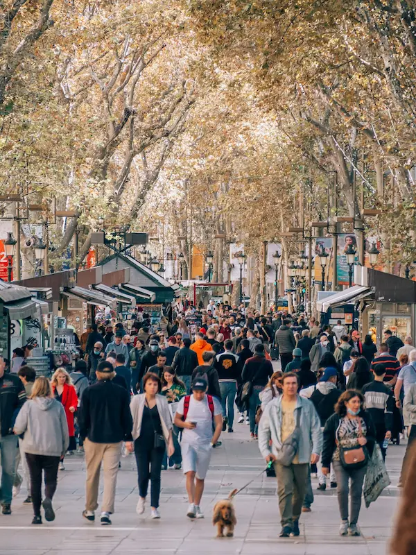 a lot of people walking on la rambla street 