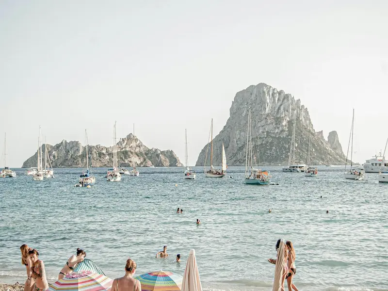 people swimming in beach in Ibiza, España
