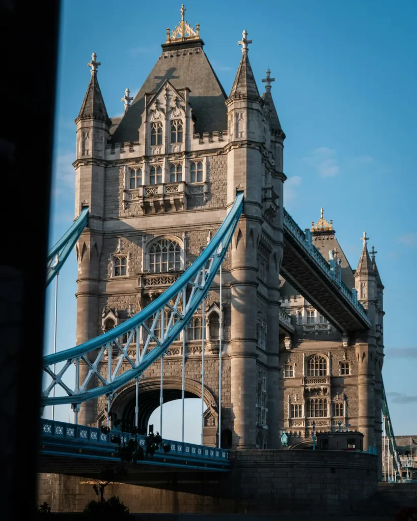 Dramatic angled view of a Tower Bridge tower from below